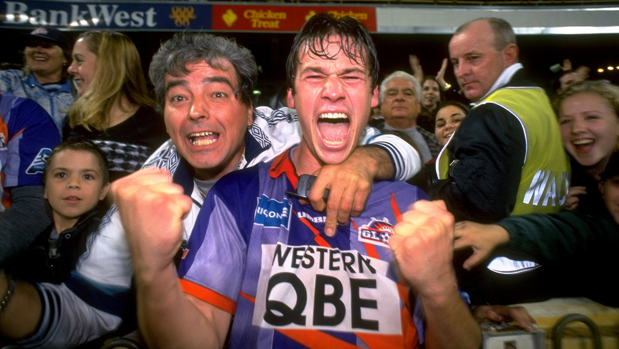 Jamie Harnwell celebrates with fans after 1999 Elimination Final v Adelaide